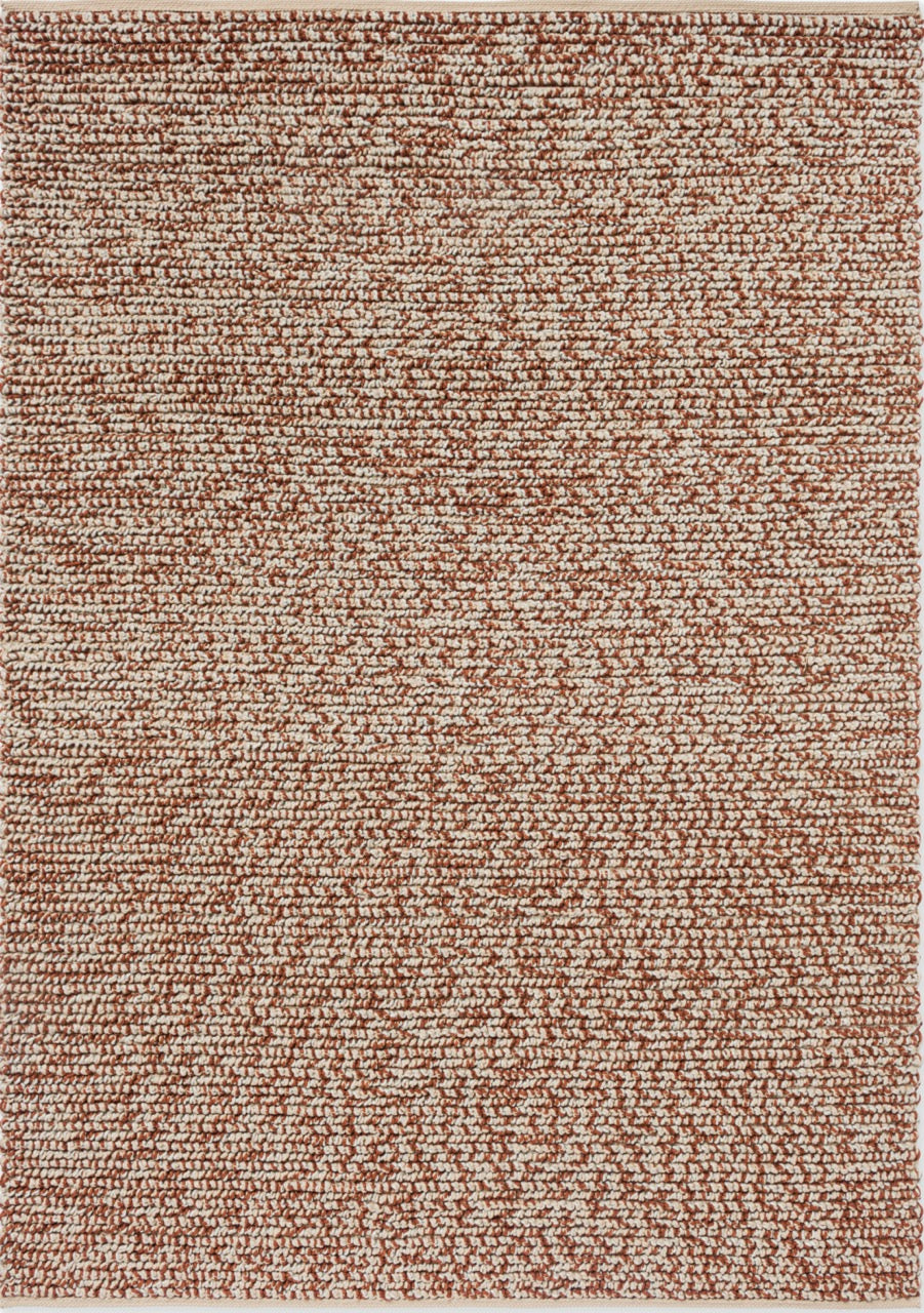 Top-down image of the Brink & Campman Nest Leather rug displaying its warm, earthy tones and textured surface.