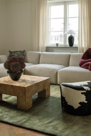 Olive Green Wool Rug, Layered Capulet Olive, in a living room