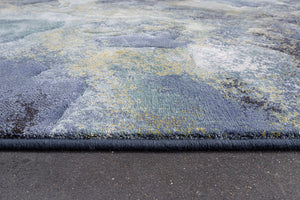 Side view of the low pile and finished edge of the Tapison Home Torino 063.0934.5241 rug