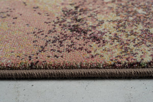 Side view of the low pile and finished edge of the Tapison Home Torino 063.0934.7274 rug