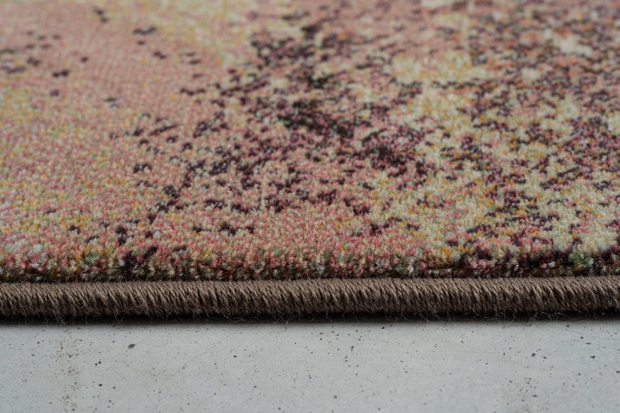 Side view of the low pile and finished edge of the Tapison Home Torino 063.0934.7274 rug