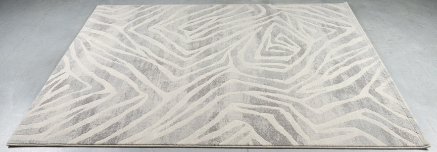 Tapison Home Torino 063.0990.6797 rug lying flat on the floor, seen at an angle