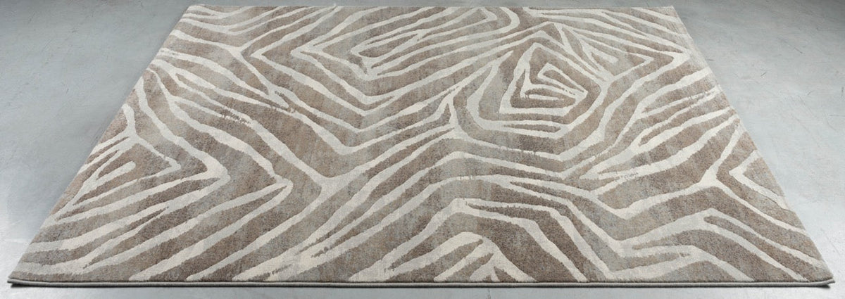 Tapison Home Torino 063.0990.9243 rug lying flat on the floor, seen at an angle
