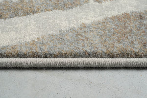 Side view of the low pile and finished edge of the Tapison Home Torino 063.0990.9243 rug