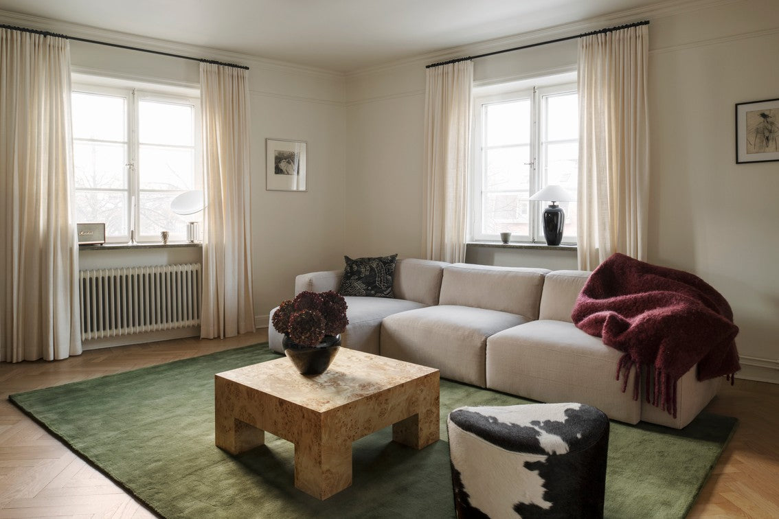Olive Green Wool Rug, Layered Capulet Olive, in a living room