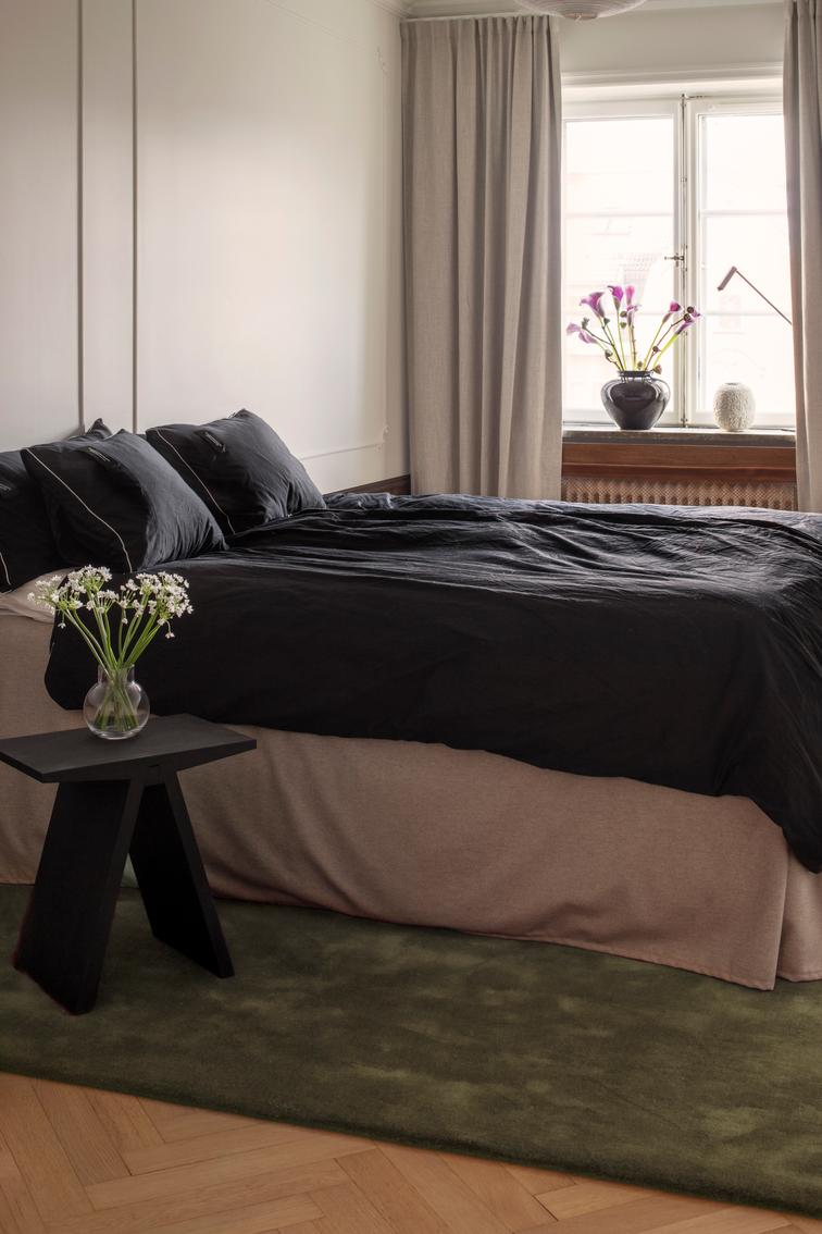 Olive Green Wool Rug, Layered Capulet Olive, in a bedroom