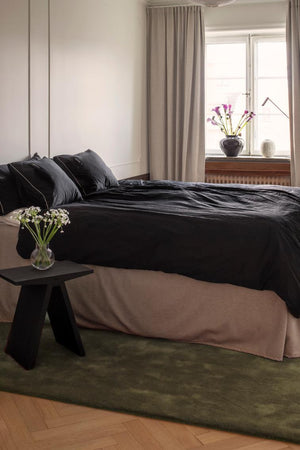 Olive Green Wool Rug, Layered Capulet Olive, in a bedroom
