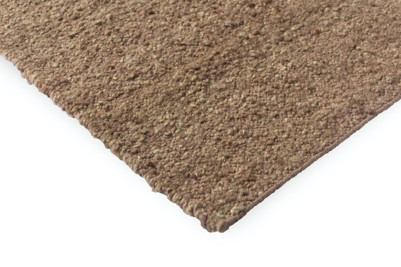 Edge view showing soft pile height and carved geometric structure