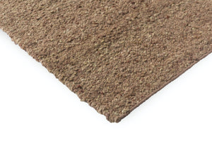 Edge view showing soft pile height and carved geometric structure