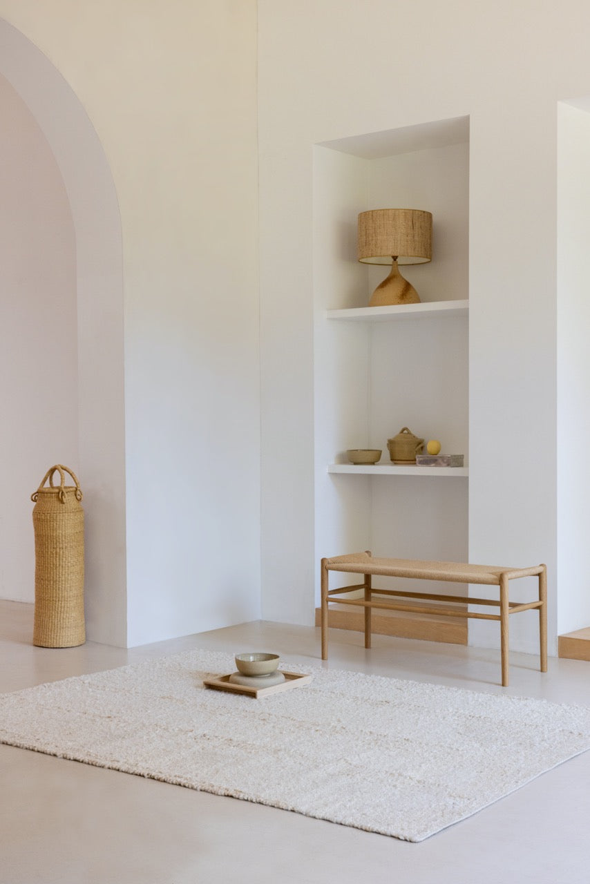 Brink & Campman Craft Fundament Wool White rug in light-filled modern interior