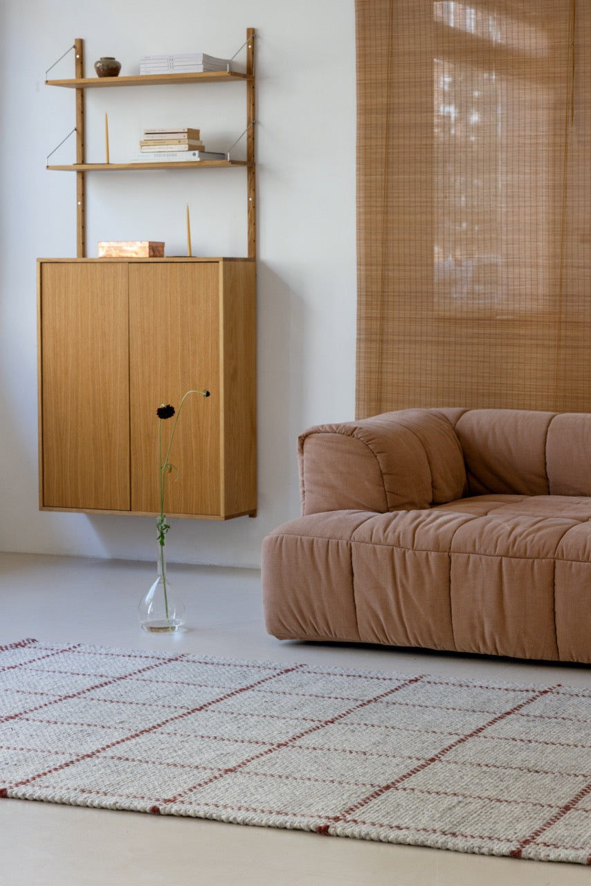 Brink & Campman Craft Matter Check Ash Stone Red rug styled in soft contemporary space