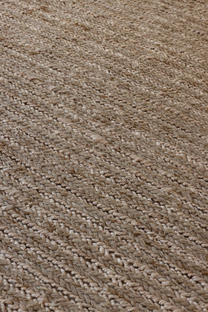 Close-up of braided plait texture in undyed wool flatweave rug