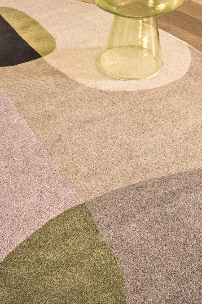 Brink & Campman Decor Miller Autumn rug in sand beige, blush pink and olive green, shown in an interior, second view