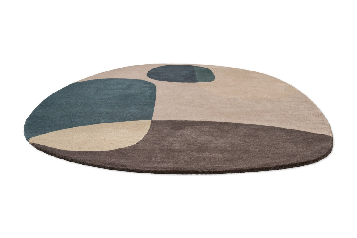 Brink & Campman Decor Miller Winter rug in petrol blue, blush beige and charcoal brown, perspective view