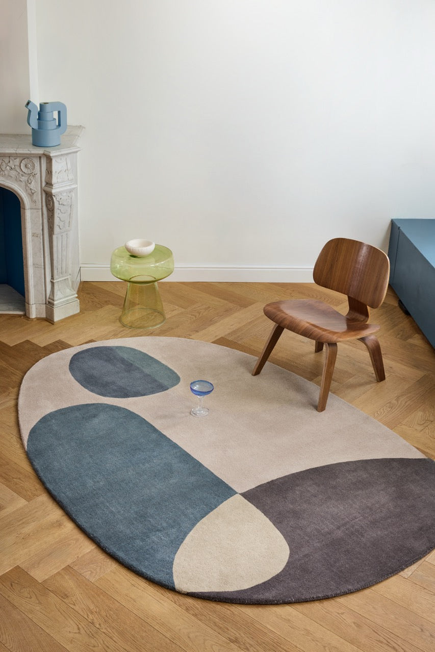 Brink & Campman Decor Miller Winter rug in petrol blue, blush beige and charcoal brown, shown in an interior