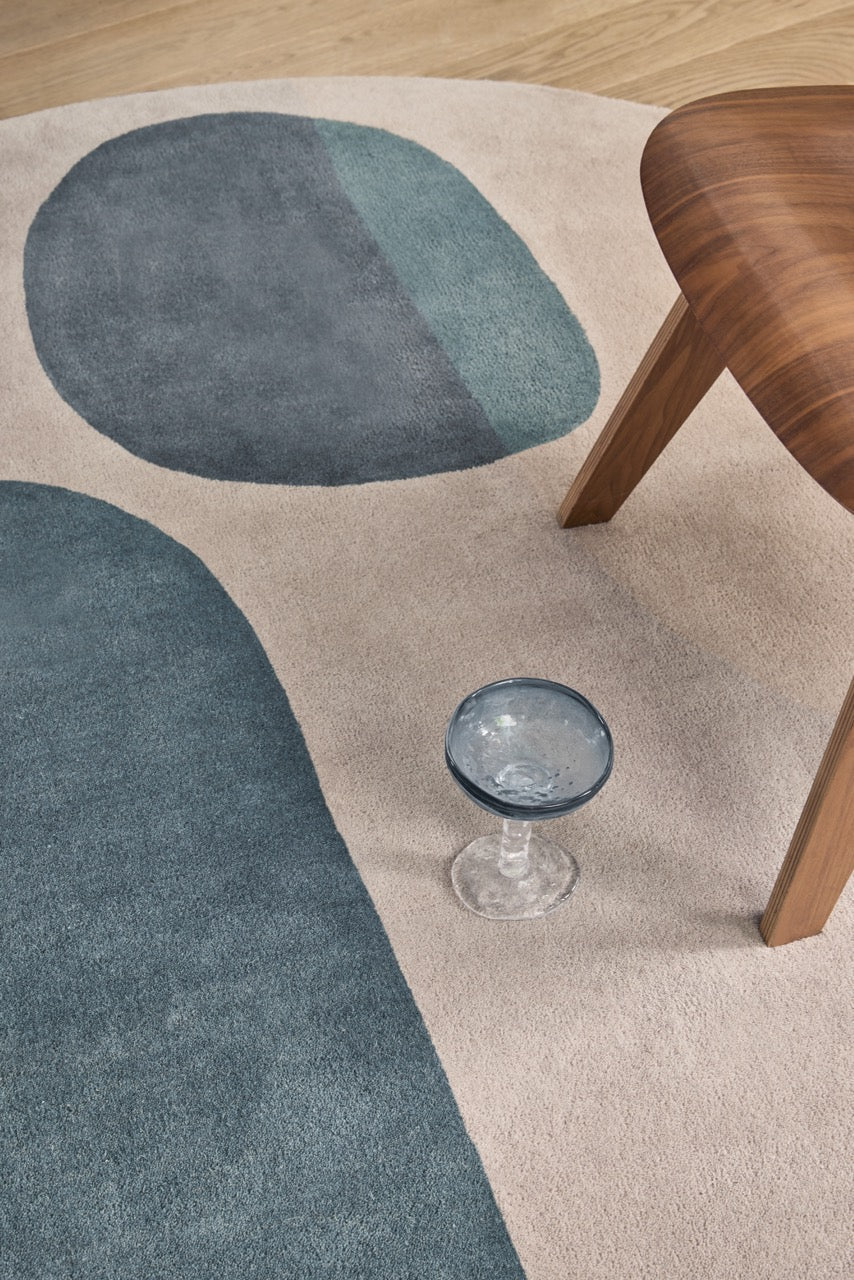 Brink & Campman Decor Miller Winter rug in petrol blue, blush beige and charcoal brown, shown in an interior, second view