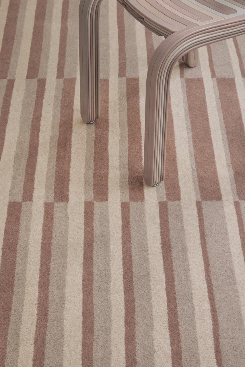 Brink & Campman Decor Pilar Blush rug in dusty pink with cream and greige stripes, shown in an interior, second view