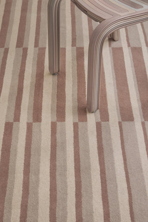 Brink & Campman Decor Pilar Blush rug in dusty pink with cream and greige stripes, shown in an interior, second view