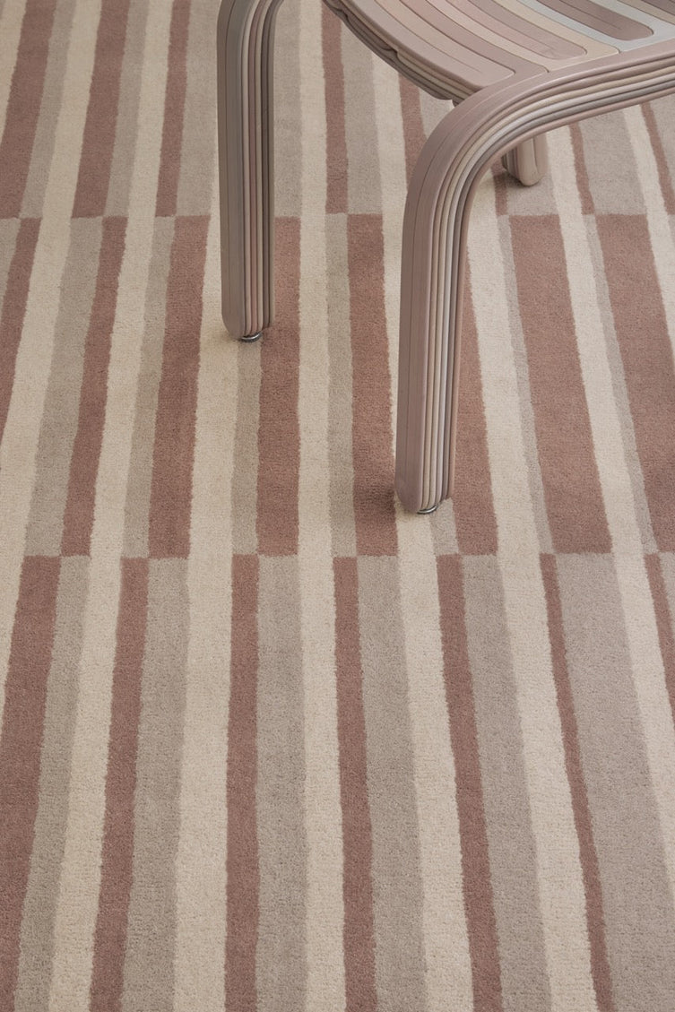 Brink & Campman Decor Pilar Blush rug in dusty pink with cream and greige stripes, shown in an interior, second view