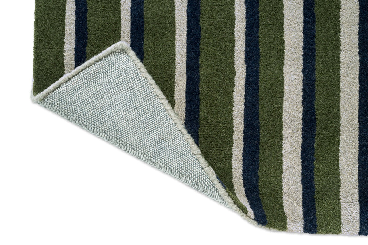 Brink & Campman Decor Pilar Moss rug, detail of folded corner and backing