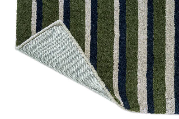 Brink & Campman Decor Pilar Moss rug, detail of folded corner and backing
