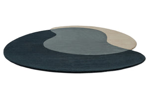 Brink & Campman Element Lane Blue rug in midnight blue, slate blue and sand beige, perspective view