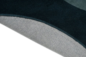 Brink & Campman Element Lane Blue rug, detail of folded edge and backing