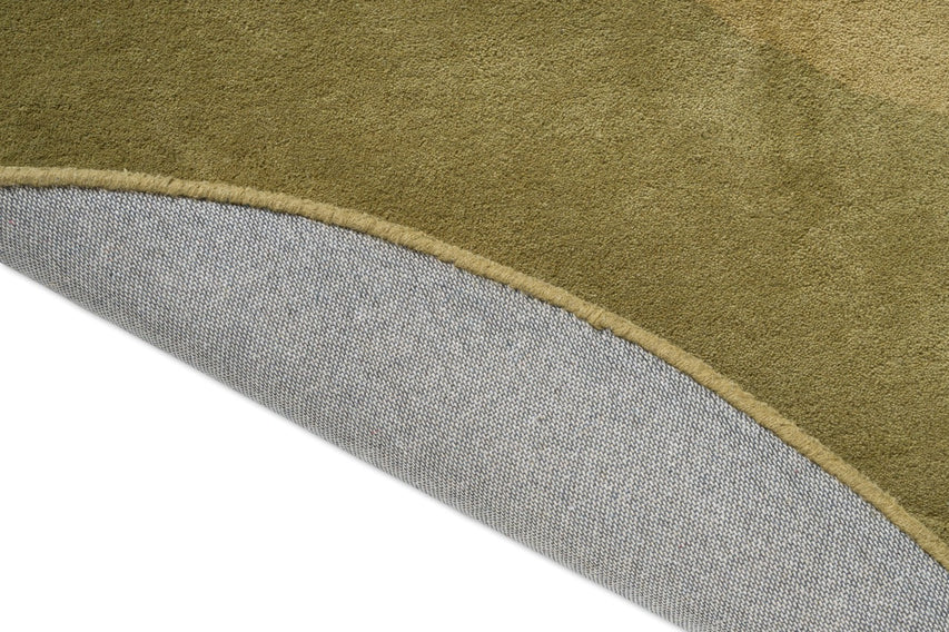 Brink & Campman Element Lane Green rug, detail of folded edge and backing