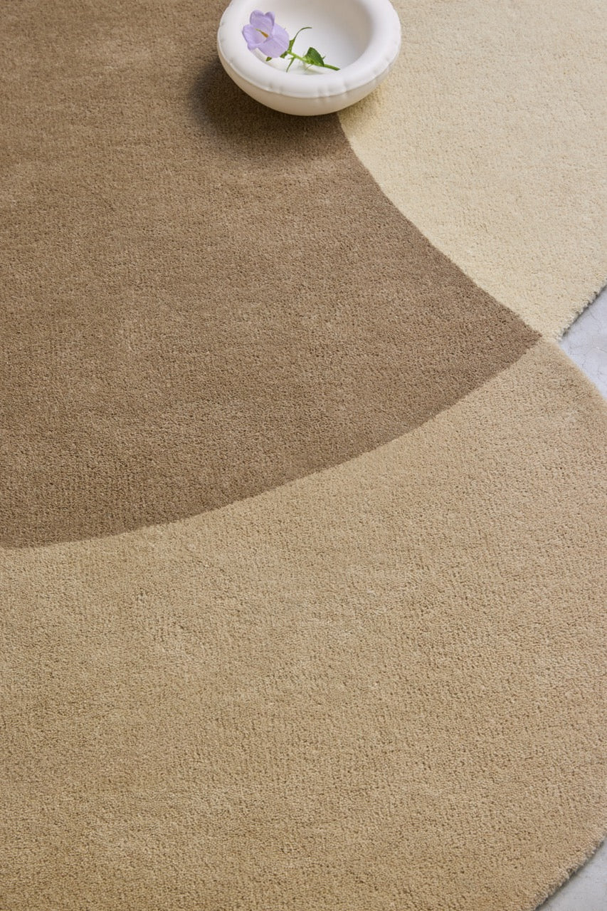 Brink & Campman Element Lane Neutral rug in sand beige, taupe and cream, shown in an interior, second view