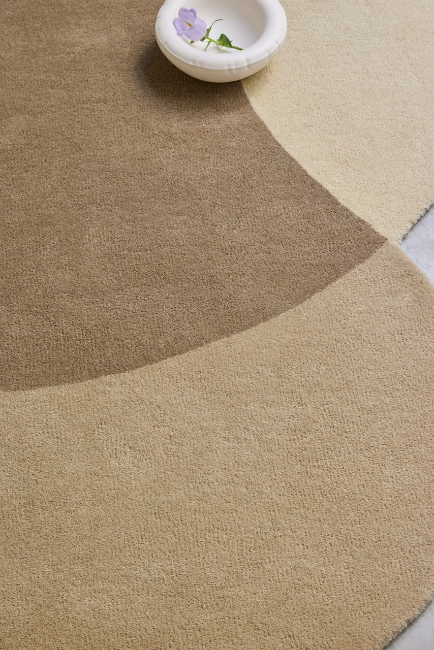 Brink & Campman Element Lane Neutral rug in sand beige, taupe and cream, shown in an interior, second view