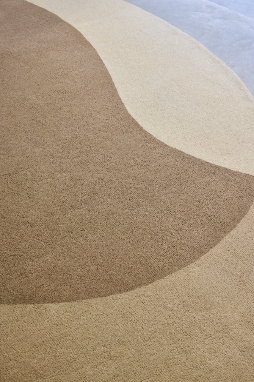Brink & Campman Element Lane Neutral rug in sand beige, taupe and cream, shown in an interior, third view