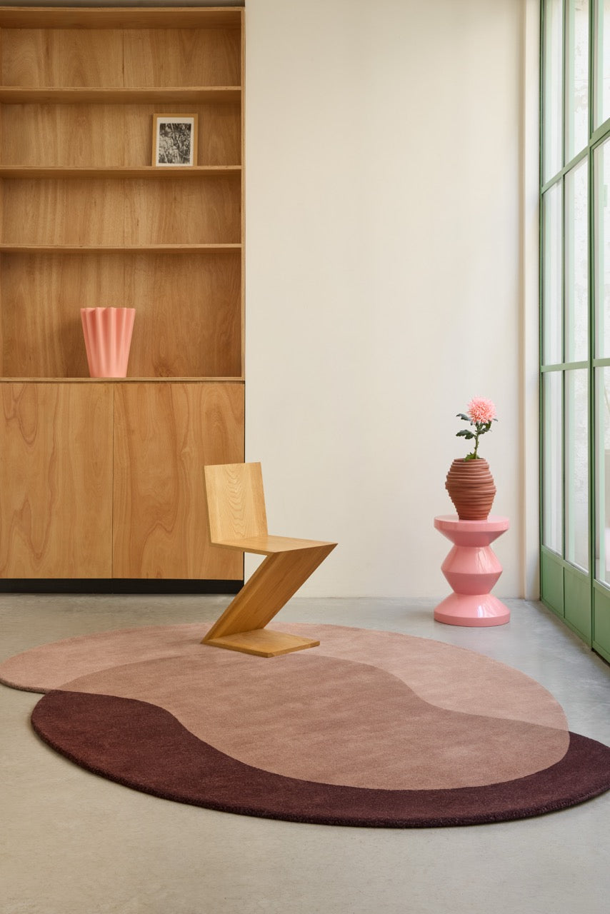 Brink & Campman Element Lane Red rug in dusty rose, mauve brown and aubergine, shown in an interior