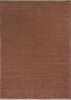 Top-down view of Frame Brick rug showing tonal red border design