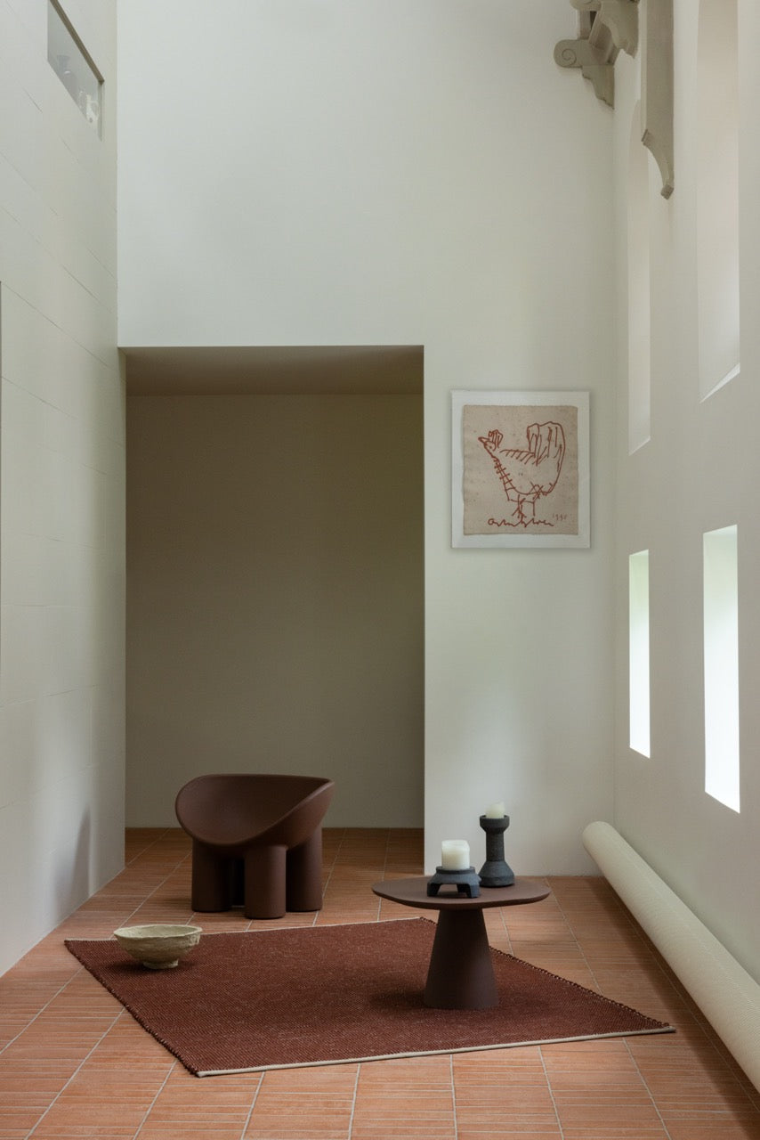Brink & Campman Frame Brick rug styled in an architectural living room with modern furniture
