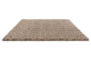 Brink & Campman Loom Natural rug in beige and cream with grey and charcoal flecks, perspective view