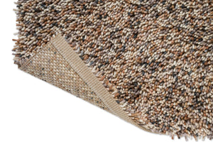 Brink & Campman Loom Natural rug, detail of folded corner and backing