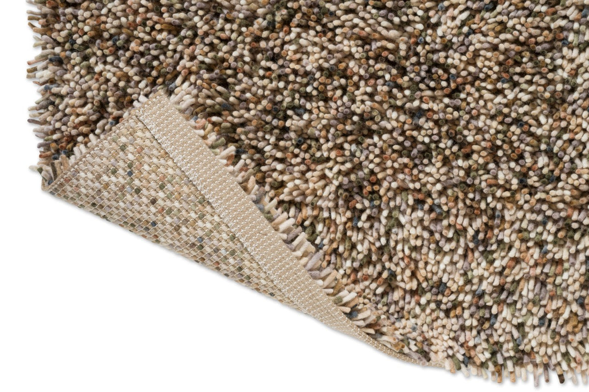 Brink & Campman Loom Natural Moss rug, detail of folded corner and backing