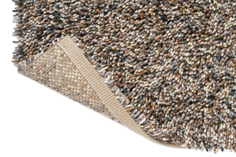 Brink & Campman Loom Natural Storm rug, detail of folded corner and backing