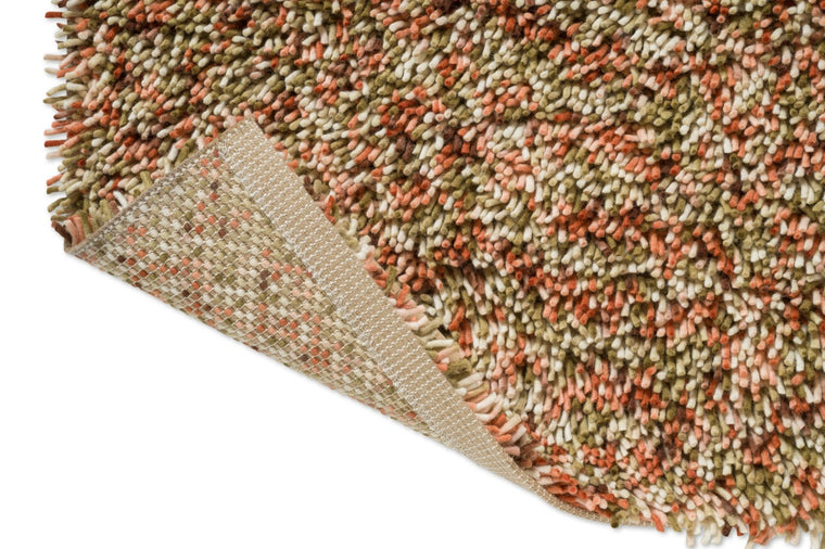 Brink & Campman Loom Pumpkin rug, detail of folded corner and backing