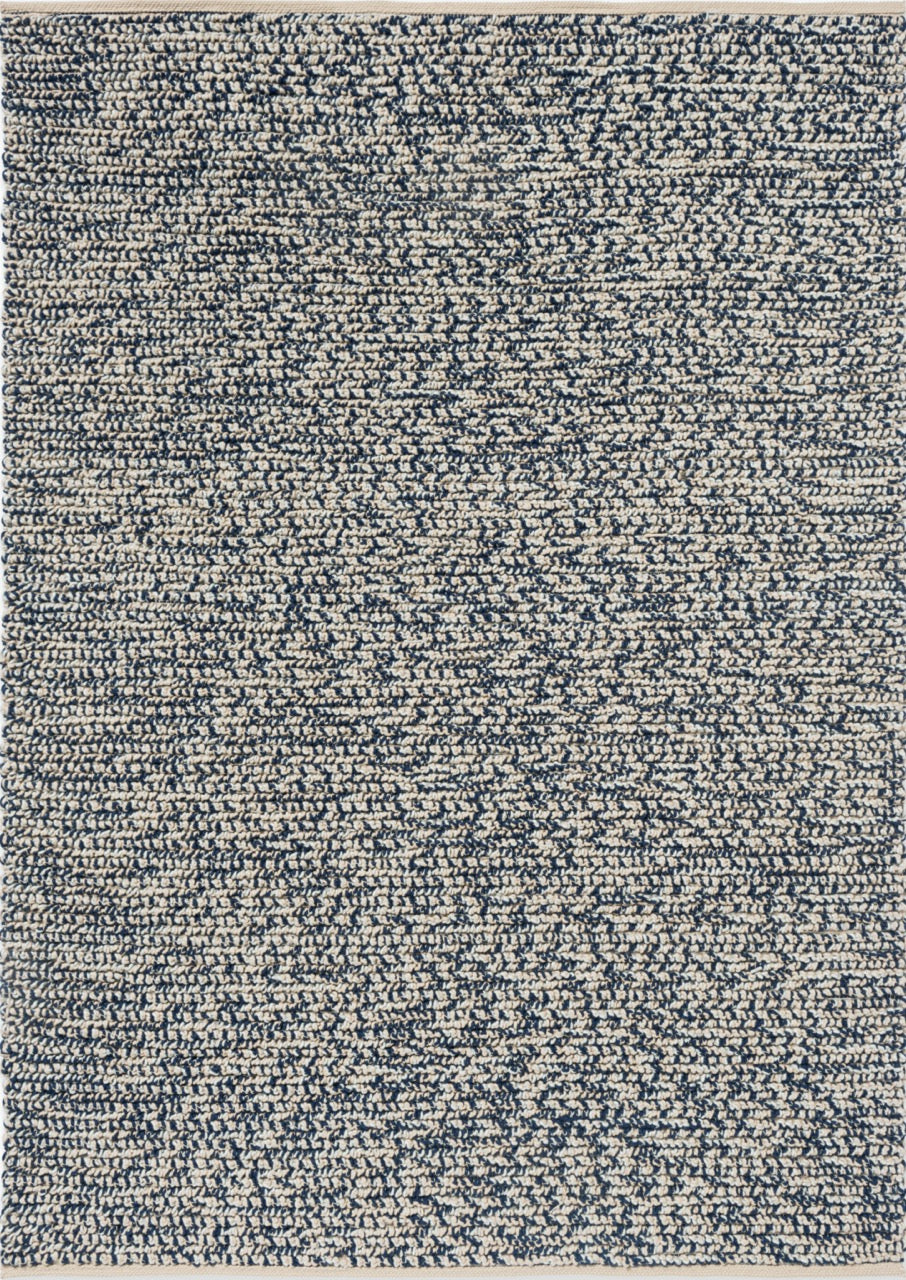 Top-down image of Brink & Campman Nest Ink rug in tonal navy wool with rounded surface texture