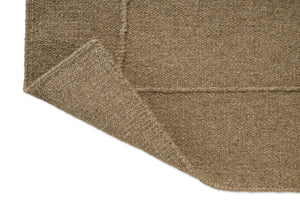 Brink & Campman Senso Blocks Fur Brown rug, detail of folded corner and reverse side