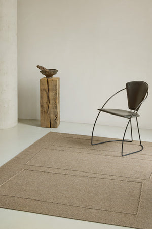 Brink & Campman Senso Blocks Fur Brown rug in camel brown with three blocks in relief, shown in an interior
