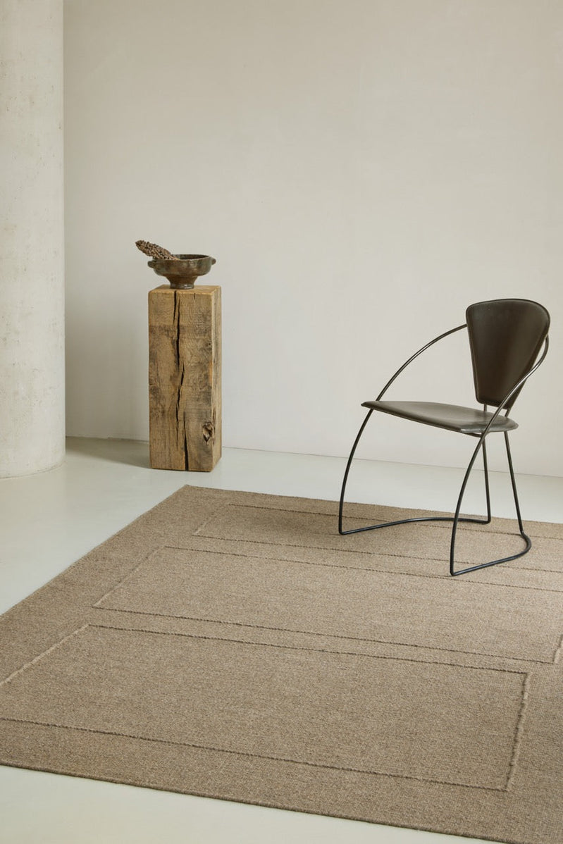 Brink & Campman Senso Blocks Fur Brown rug in camel brown with three blocks in relief, shown in an interior