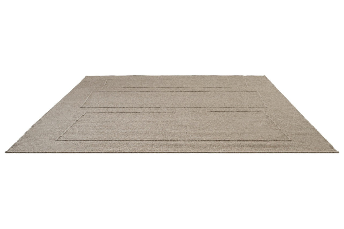 Brink & Campman Senso Blocks Soft Taupe rug in grey taupe with three blocks in relief, perspective view