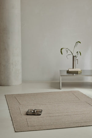 Brink & Campman Senso Blocks Soft Taupe rug in grey taupe with three blocks in relief, shown in an interior