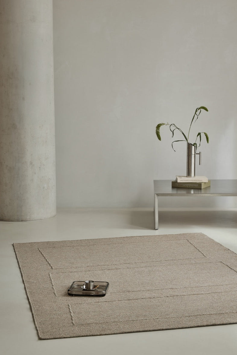Brink & Campman Senso Blocks Soft Taupe rug in grey taupe with three blocks in relief, shown in an interior