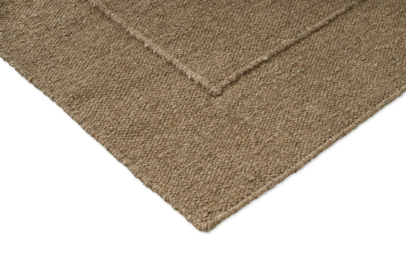 Brink & Campman Senso Border Fur Brown rug, detail of corner and weave