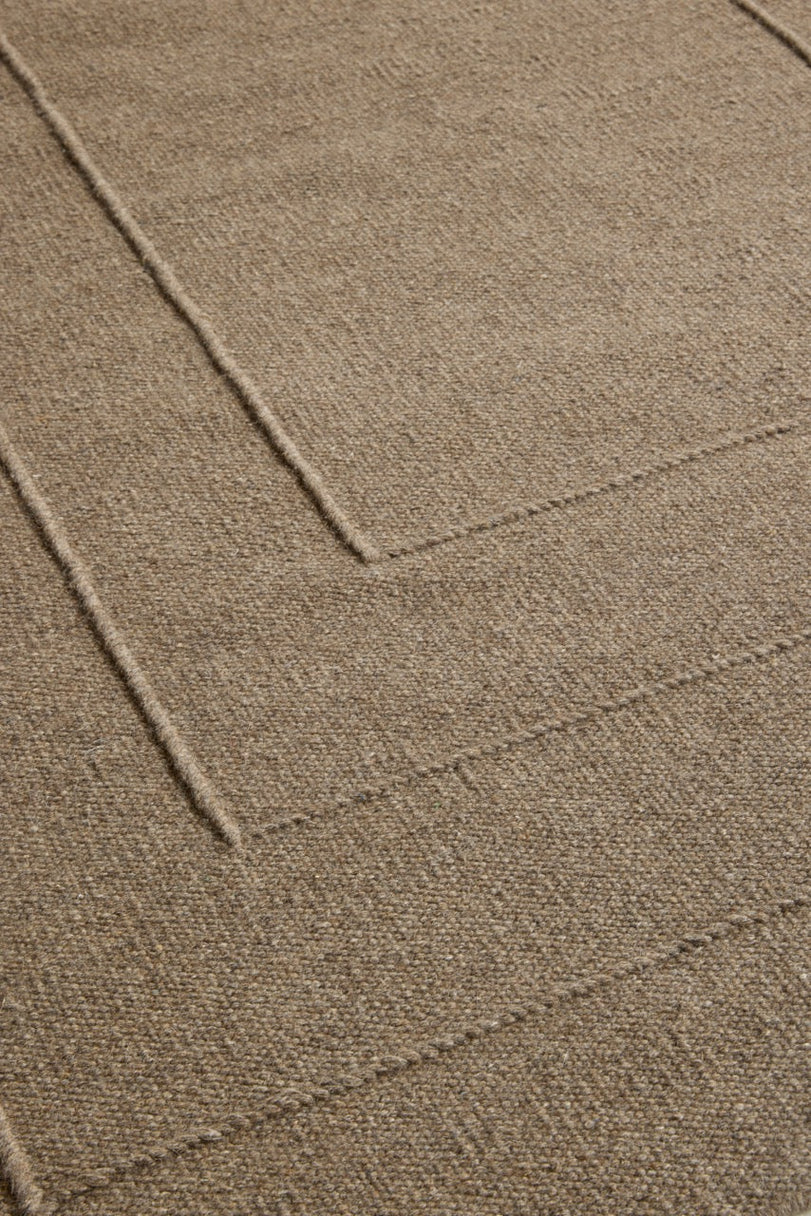 Brink & Campman Senso Border Fur Brown rug in camel brown with three frames in relief, shown in an interior, second view