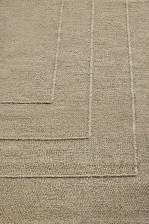 Brink & Campman Senso Border Natural rug in sand beige with three frames in relief, shown in an interior, second view