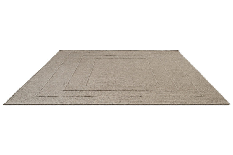 Brink & Campman Senso Border Soft Taupe rug in grey taupe with three frames in relief, perspective view